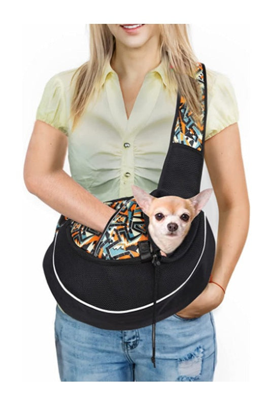 Orange lightweight pet carrier bag with breathable mesh panels for ventilation"