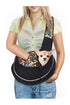 Orange lightweight pet carrier bag with breathable mesh panels for ventilation"